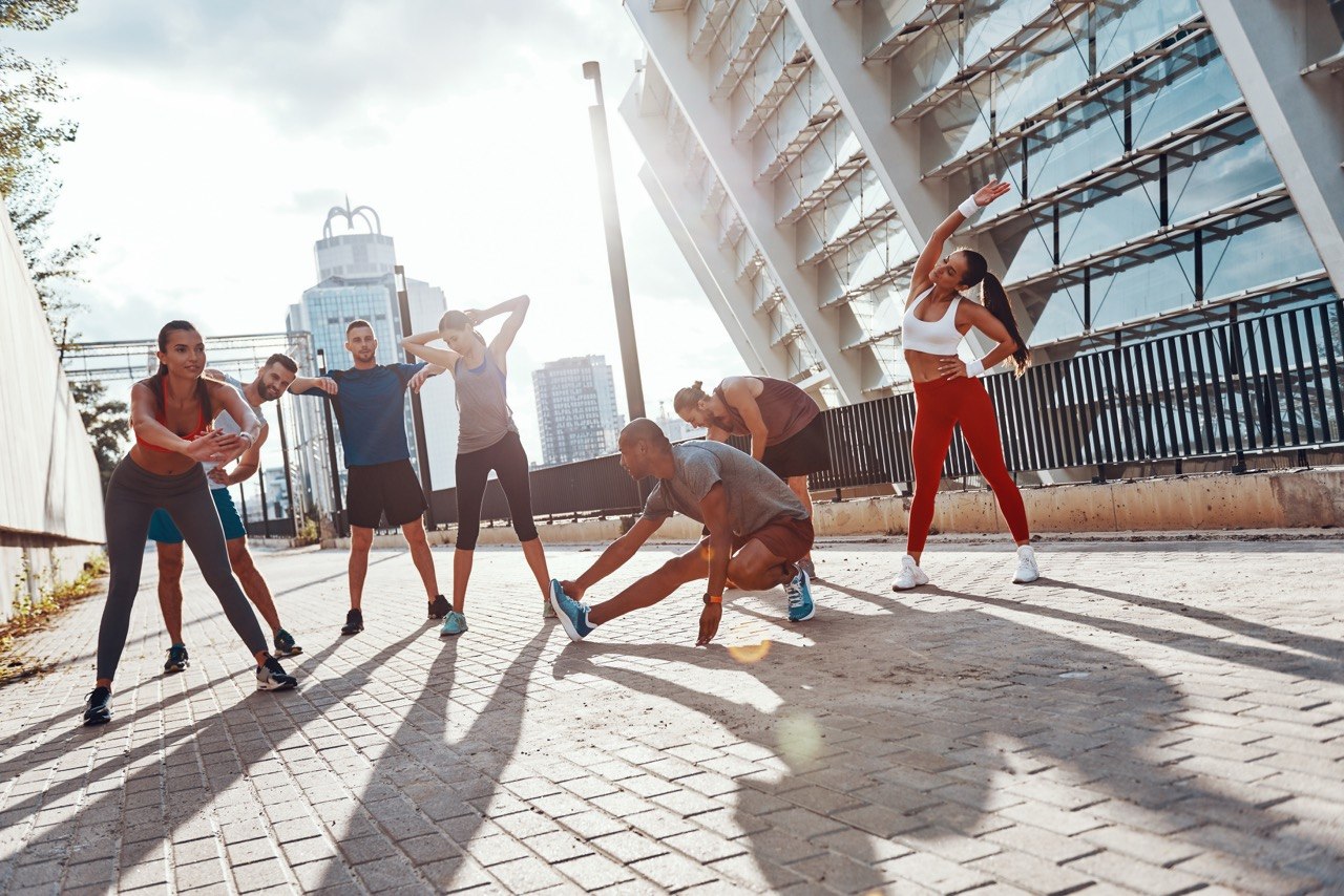 A group moving together in an outdoor urban space